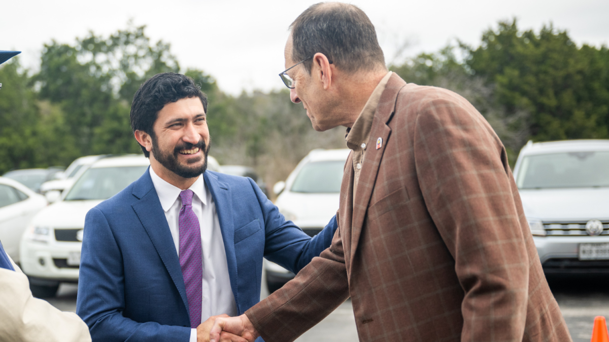 Congressman Greg Casar (D-Texas) shakes hands with Texas AFL-CIO President Rick Levy at an event in February 2024.