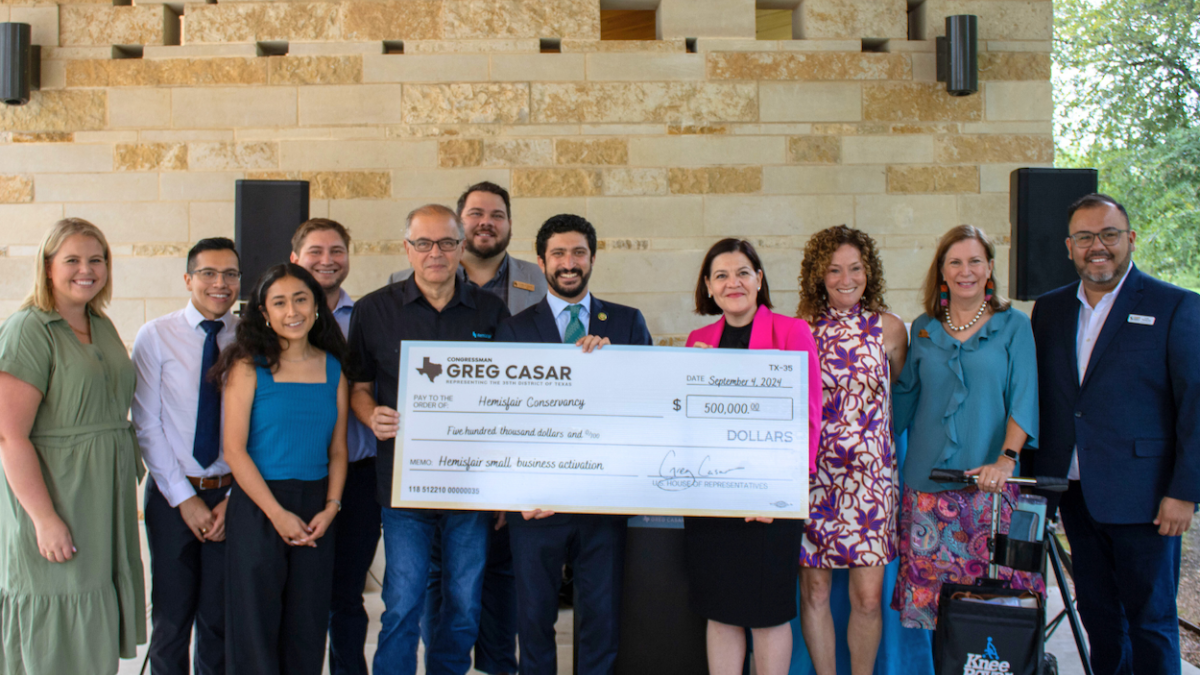 Congressman Greg Casar poses with the Hemisfair team