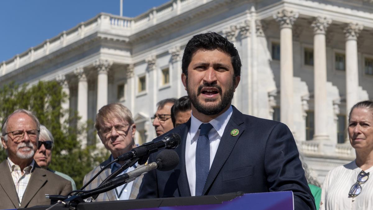 Congressman Greg Casar speaking into a microphone and addressing Members of Congress and viewers