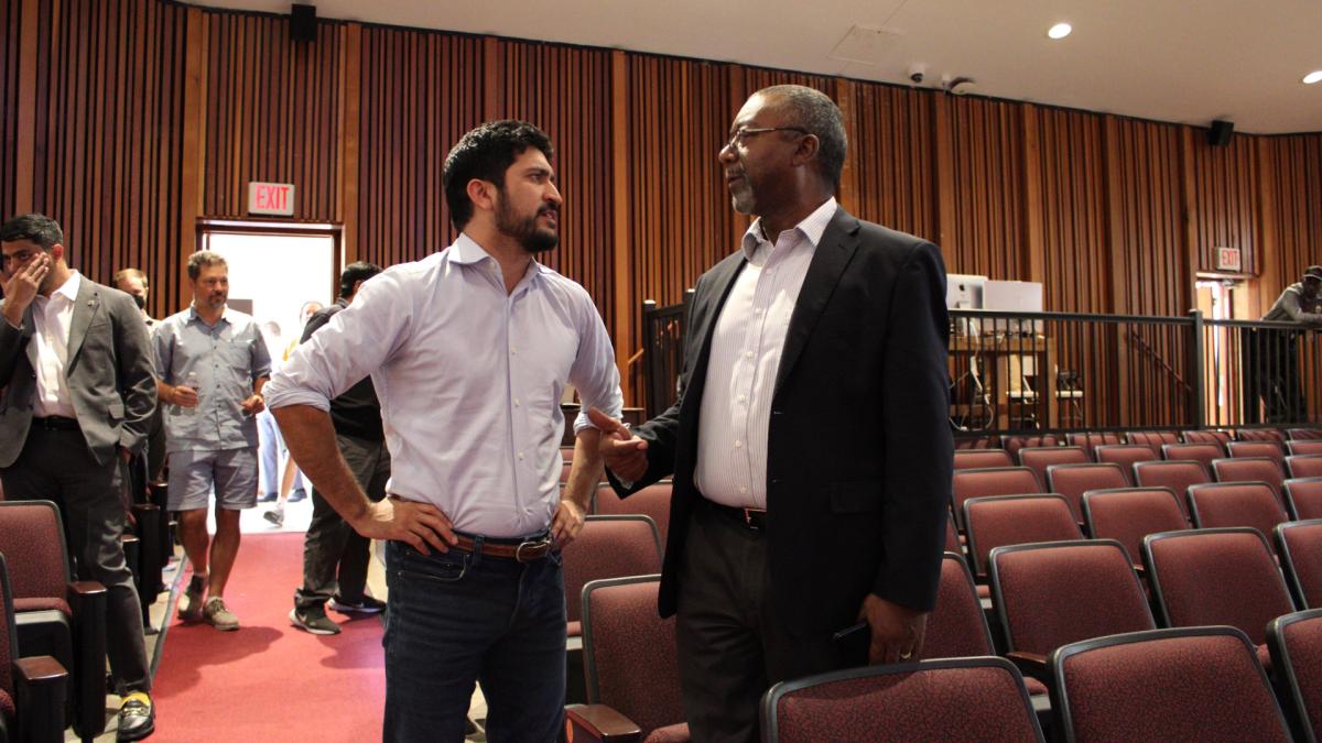 Congressman Greg Casar talking with constituent at town hall