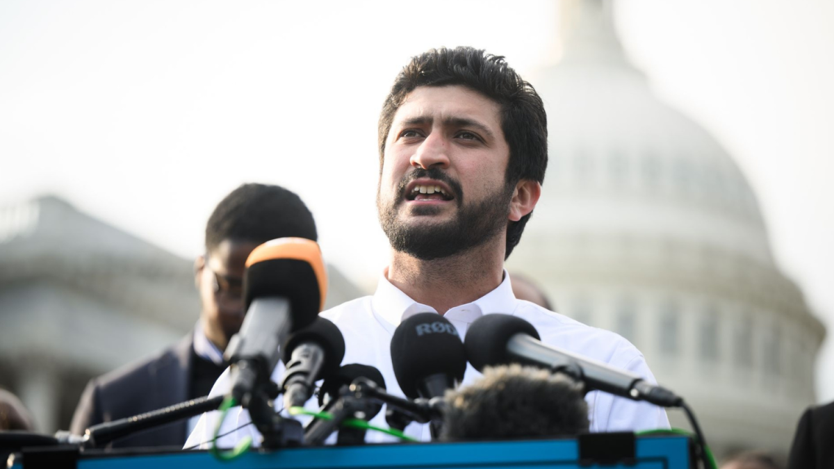 Greg Casar speaks at a press conference
