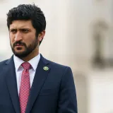 Congressman Greg Casar standing in front of a press conference