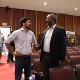 Congressman Greg Casar talking with constituent at town hall