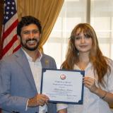 Congressman Casar posing with student artist Bella Lucia Jaimes
