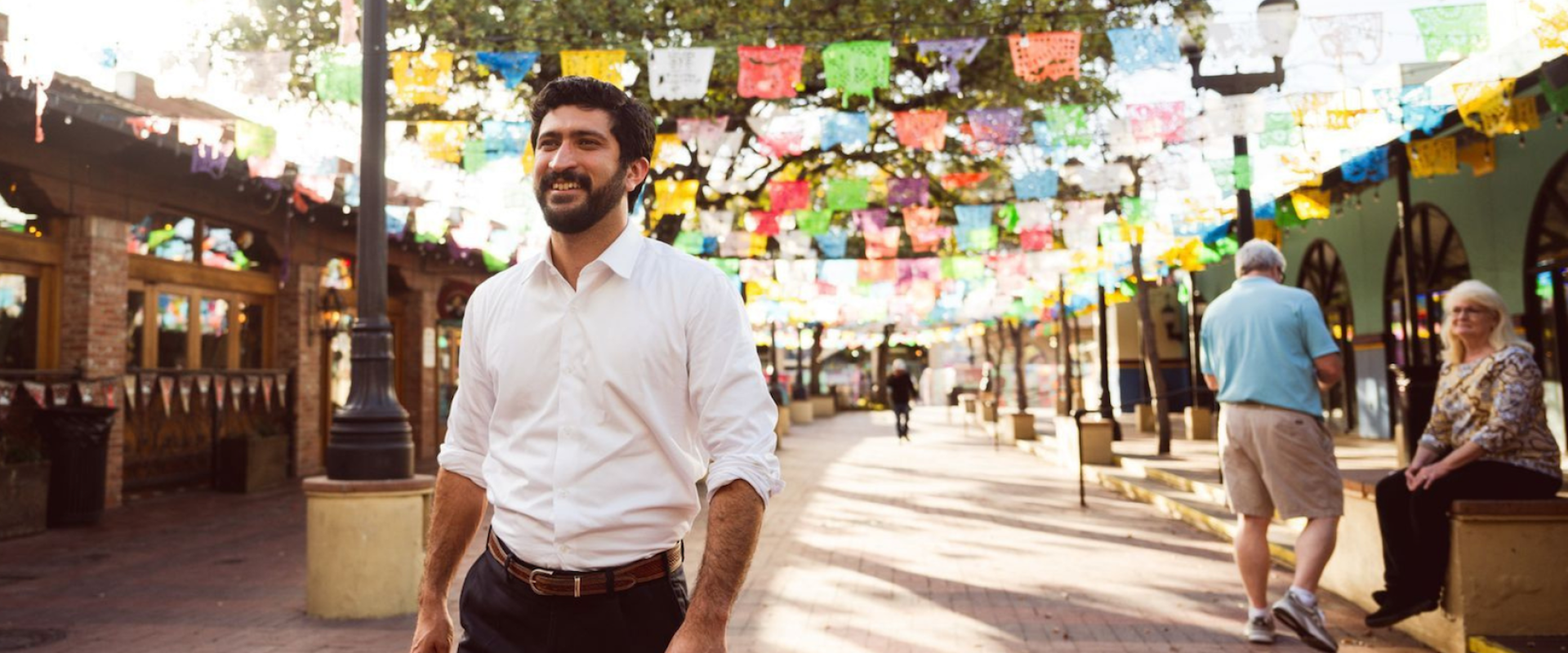 Congressman Greg Casar walks through Market Street in San Antonio